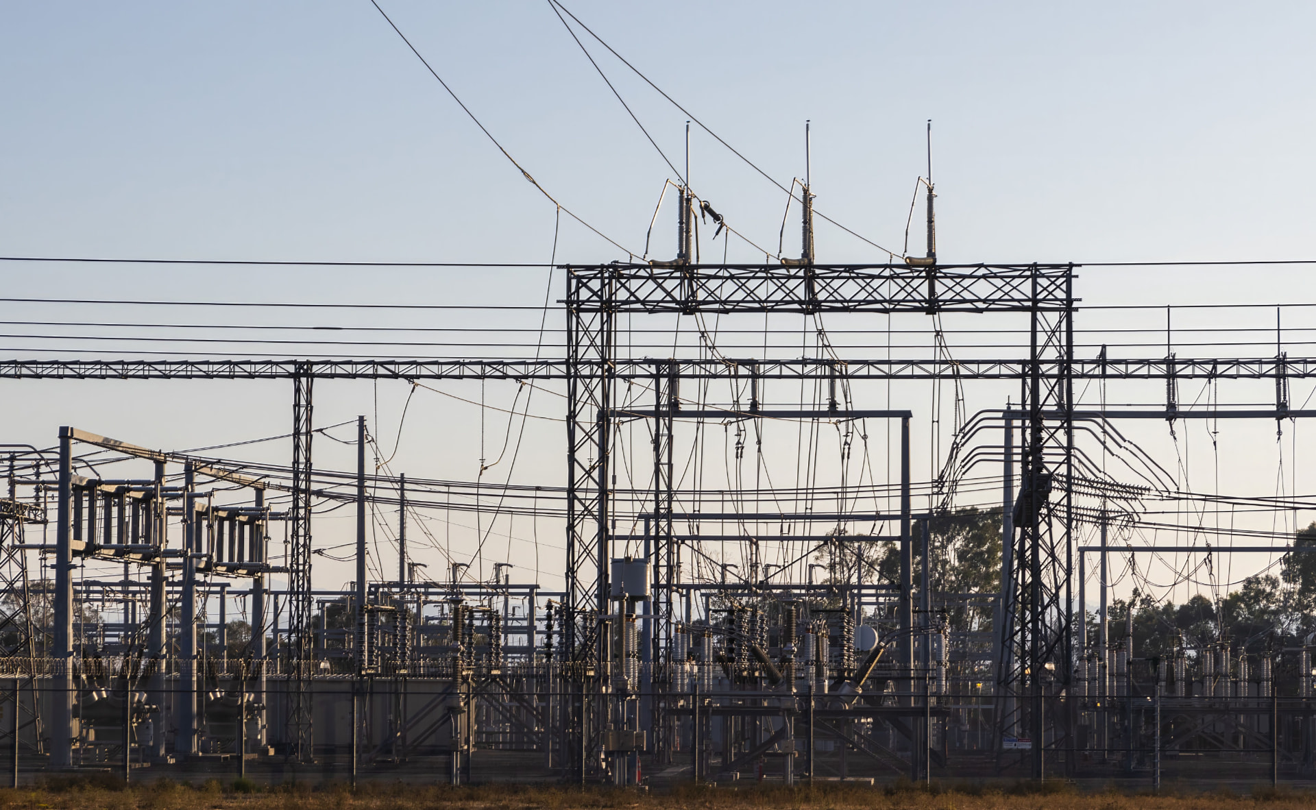Wide view of transmission equipment at an electrical substation